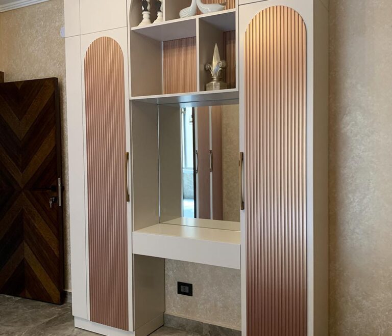 Pink & White Dresser with mirror, flanked by 2 closets for the girl's bedroom